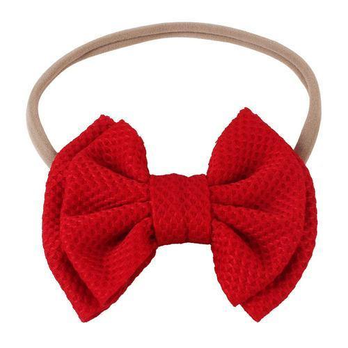 Baby girls' yellow elastic bow headband, a bright and cheerful toddler accessory.