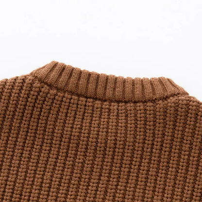 Toddler knitwear: An adorable loose-fit knitted sweater designed for autumn winter warmth.