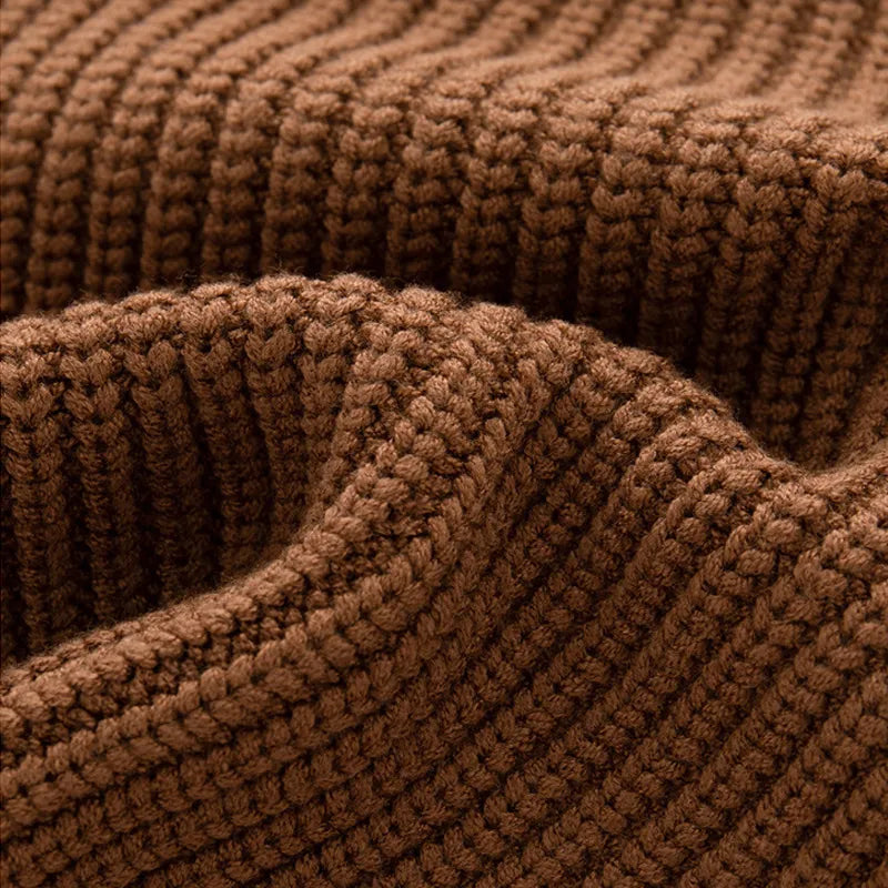 Essential autumn winter baby sweater: A cozy knitted loose design for toddlers and infants.
