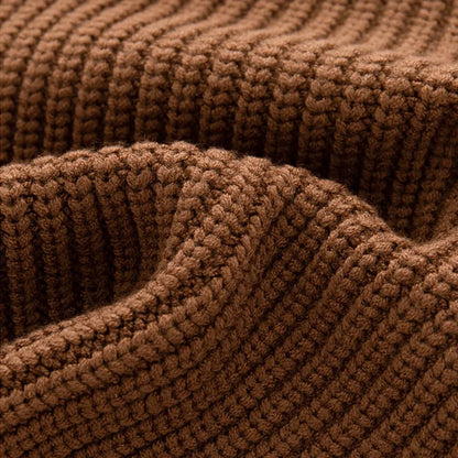 Essential autumn winter baby sweater: A cozy knitted loose design for toddlers and infants.