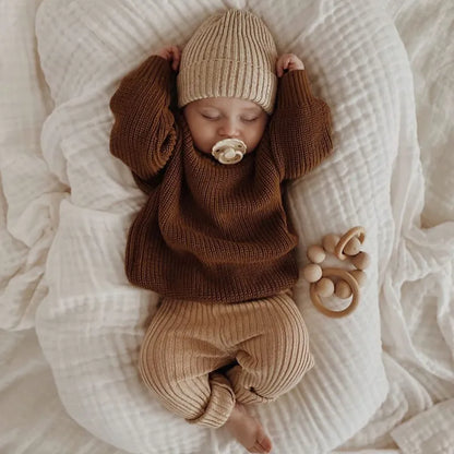 Unisex baby knitted loose sweater, ideal for autumn winter warmth, featuring a comfortable design.