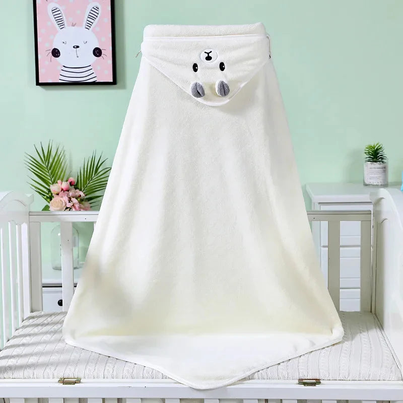 Cute baby wrapped snugly in a hooded animal swaddle blanket, perfect for keeping warm after a bath.