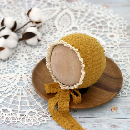Essential baby accessories: an adjustable nylon beanie hat designed for newborn warmth.