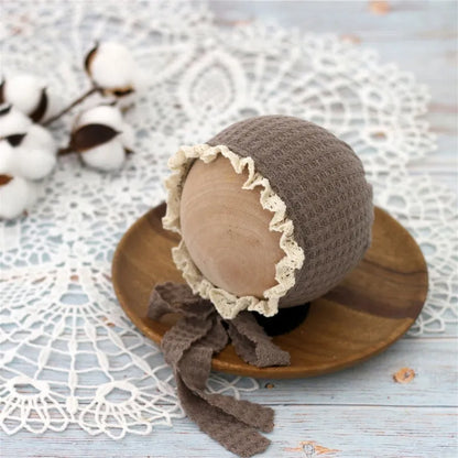 Cute adjustable nylon baby hat, perfect for keeping a newborn's head warm and cozy.