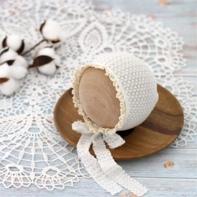 Newborn photography prop: a cute, adjustable nylon baby hat with a snug fit.