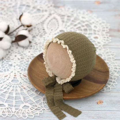 Detail view of the adjustable band on a newborn nylon beanie hat, ensuring comfort.