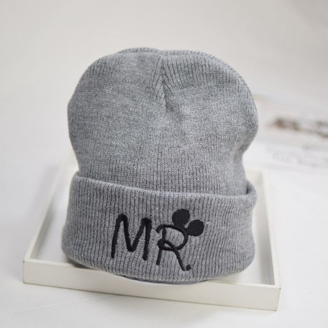Infant showcasing a cute knit baby beanie, a perfect fashion accessory for newborns.