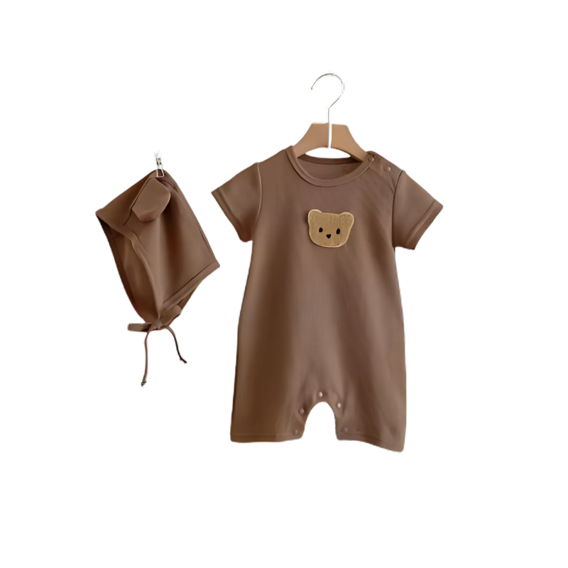 Newborn baby wearing a cozy, light brown bear-themed cotton romper and hat set, front view.