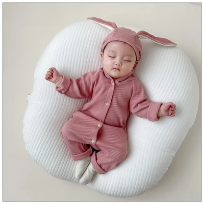 Soft cotton baby romper featuring a playful rabbit design, cozy and cute for baby fashion.
