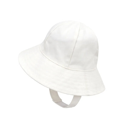Outdoor shot of an adjustable sun protection bucket hat on a baby, protecting from harsh sunlight.
