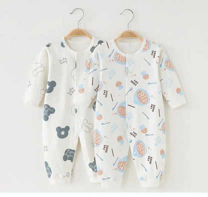 Cute baby outfit: soft cotton newborn romper with enclosed feet for extra warmth.