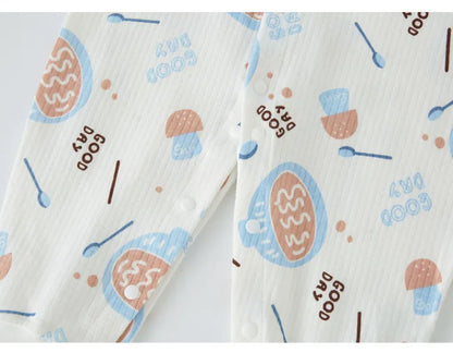 Unisex baby in a versatile cotton romper, perfect for play and sleep. All season babywear.