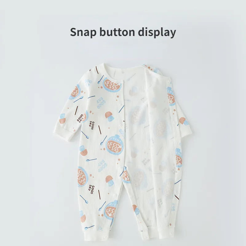 Newborn romper made of soft, breathable cotton, suitable for unisex infants.