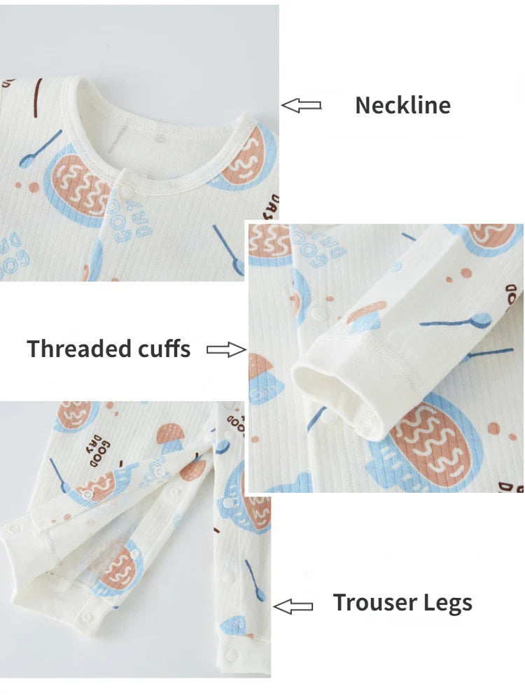 Baby boy crawling in a durable, easy-to-wear cotton newborn romper. Cute babywear.