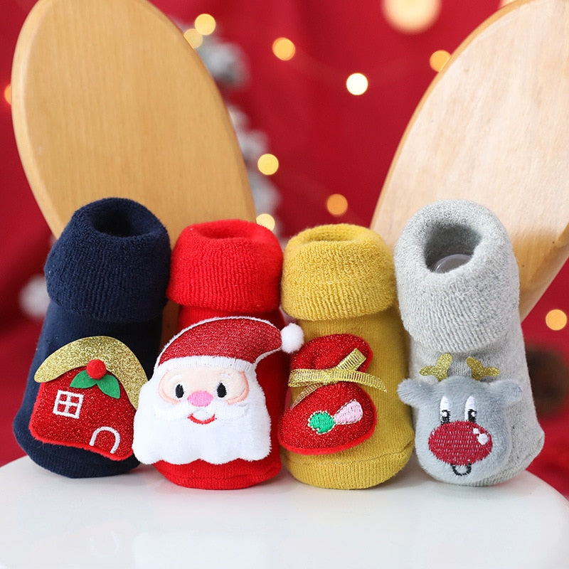 Adorable baby in thick, warm, non-slip newborn socks, ideal for winter