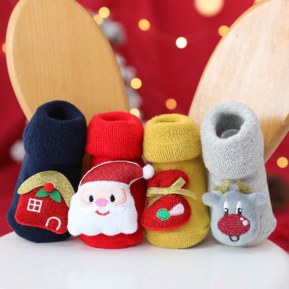 Adorable baby in thick, warm, non-slip newborn socks, ideal for winter