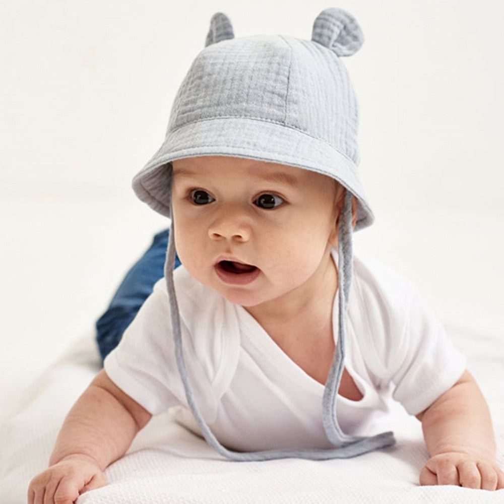 Blue cotton baby fisherman hat, a perfect accessory for sunny days, offers stylish sun protection
