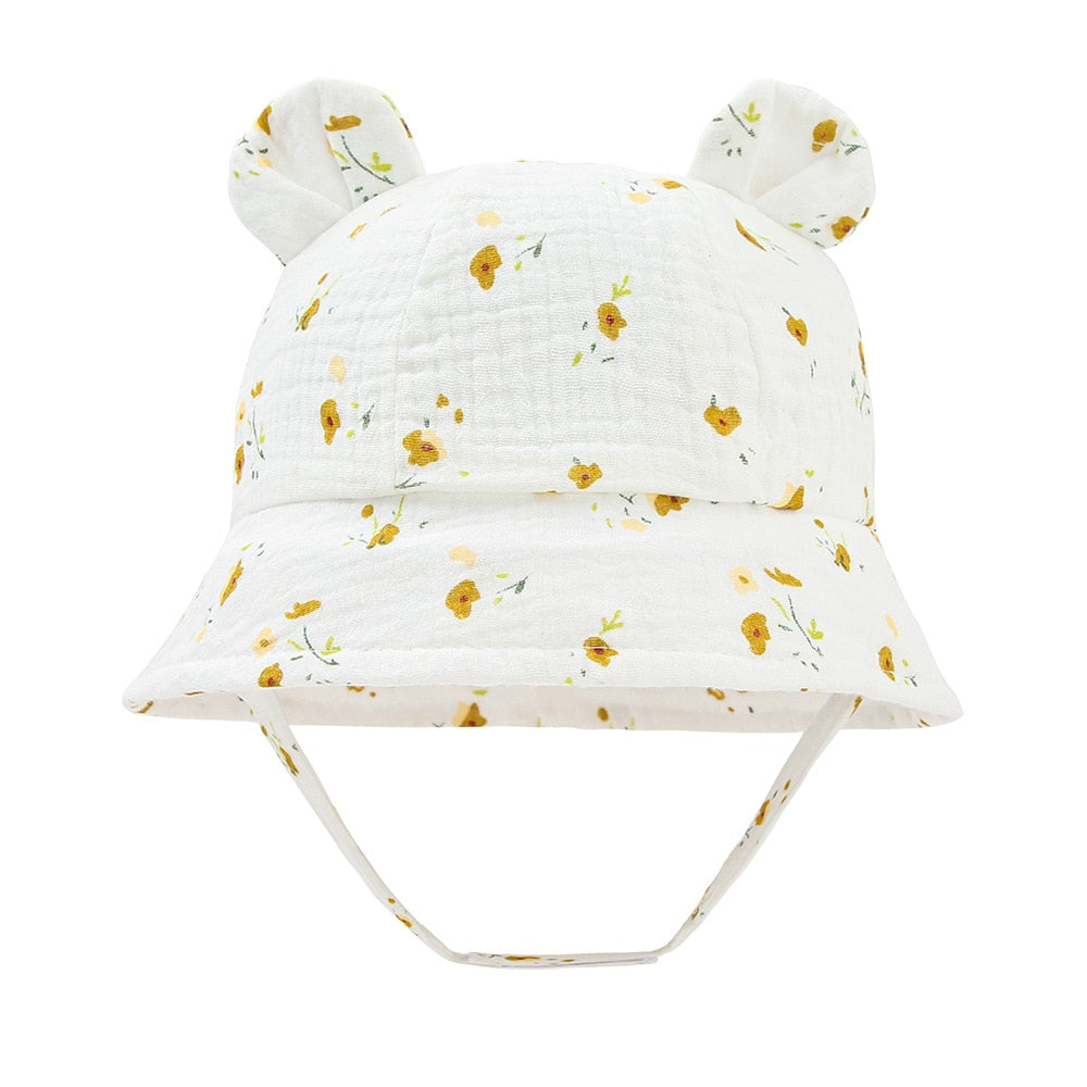 Close-up of a soft pink cotton fisherman hat for babies & toddlers, essential summer accessory