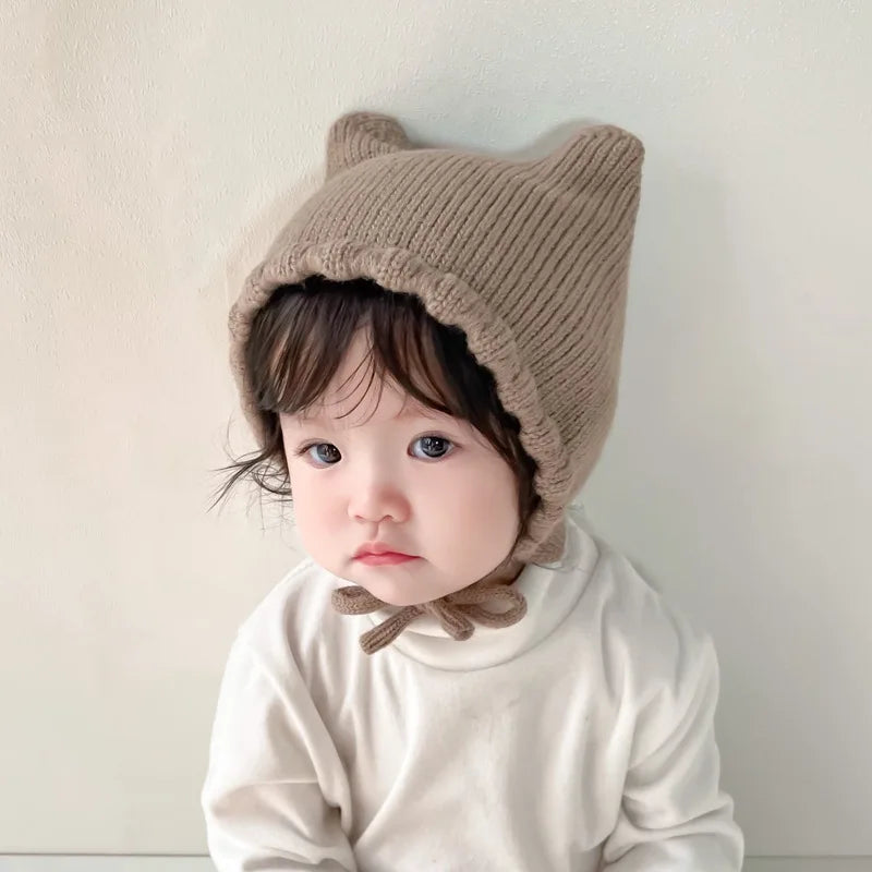 Soft baby accessory: a knit cartoon winter hat with effective ear protection