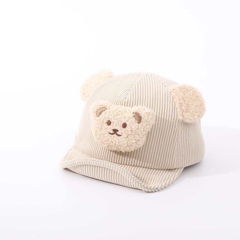 Soft infant knitted bear hat, a snug pullover cap for newborns and toddlers in various colors.