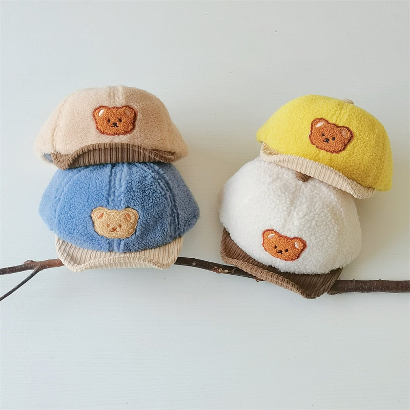 Adorable newborn bear ear cap, hand-knitted design, ensuring warmth and cuteness for infants.