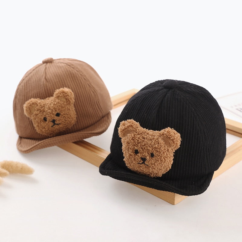 Toddler knitted winter hat with playful bear ears, a cozy and fashionable baby essential.
