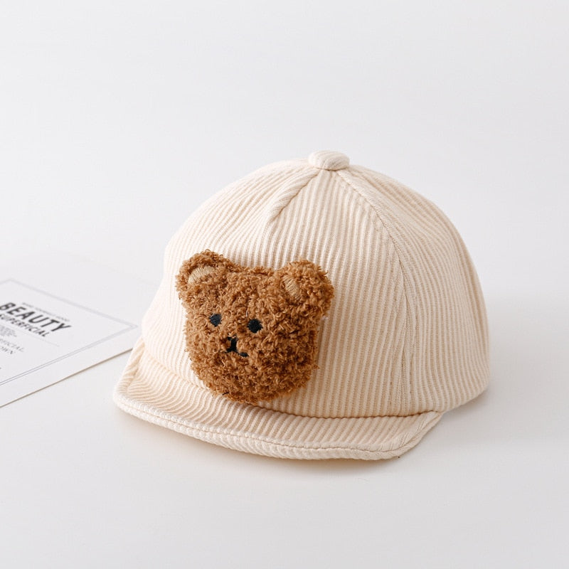 Cozy toddler pullover cap with bear ears, a soft knitted hat for winter warmth and cuteness.