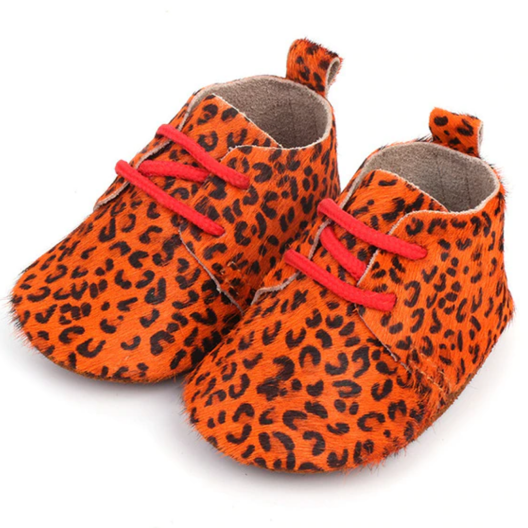 Cute pink genuine leather baby moccasins, soft sole first walker shoes, ideal anti-slip toddler footwear.