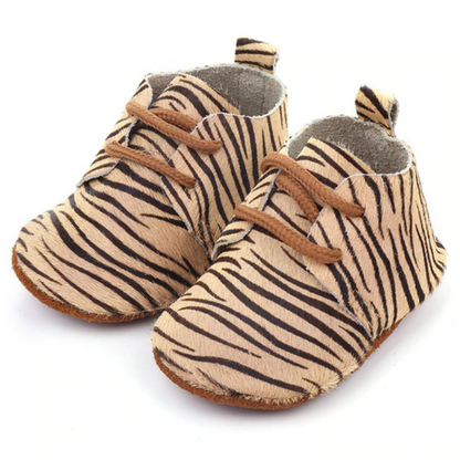 Gift-ready genuine leather baby moccasins, soft sole first walker shoes, perfect comfortable infant footwear.
