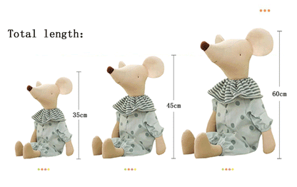 Side profile of a baby mouse stuffed animal, emphasizing its cute form and quality craftsmanship.