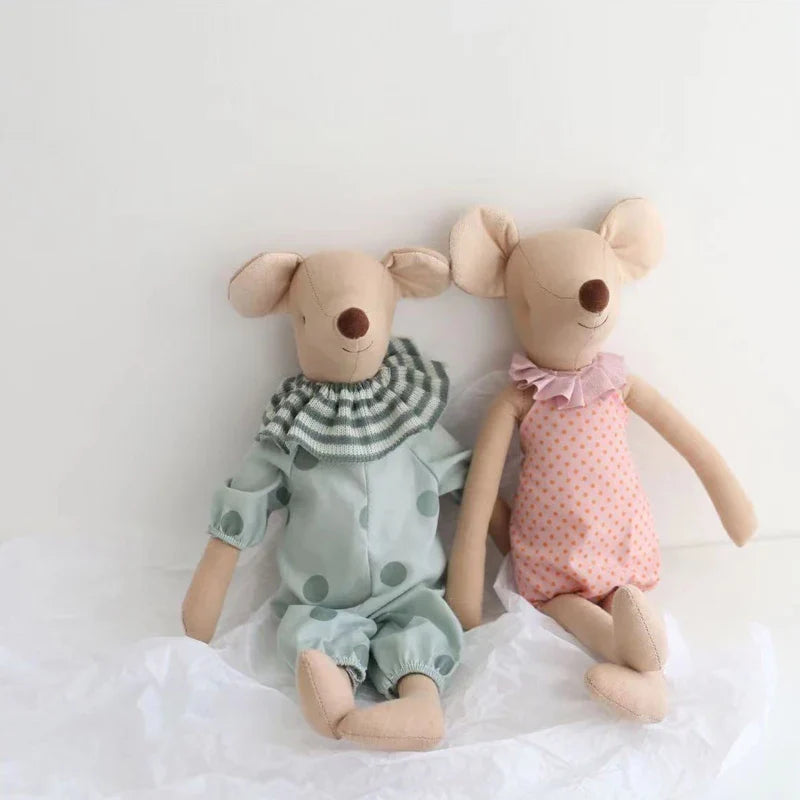 Cute pink and gray mouse plush toy, a comforting stuffed animal for kids and baby playtime.