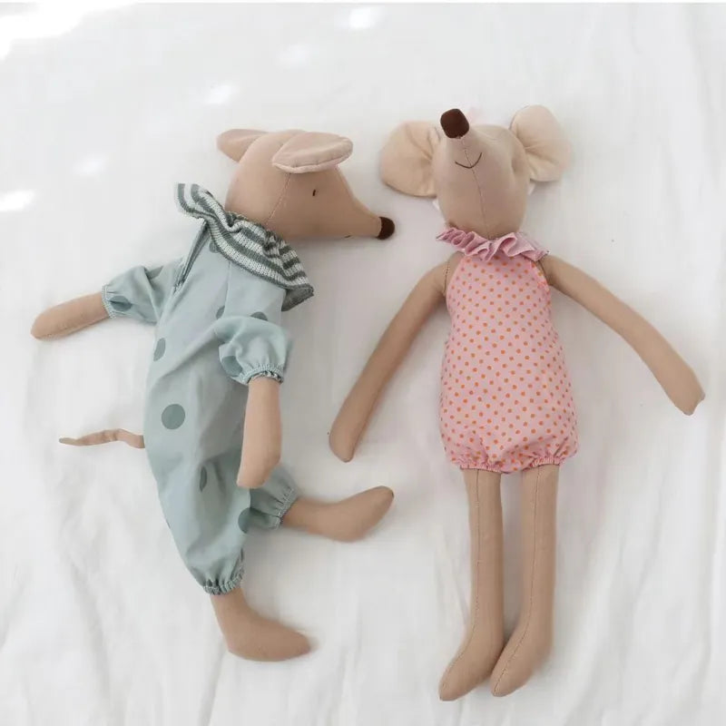 Soft baby mouse stuffed animal with stitched eyes, ideal as a gentle comfort toy for infants.