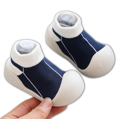 Stylish non-slip baby footwear, crafted from soft cotton in a variety of colors for little ones.