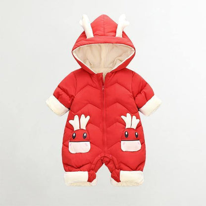 Happy baby in a cozy padded reindeer onesie, ready for winter play and holiday cheer.