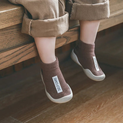 Ergonomic soft sole non-slip toddler shoes, supporting healthy foot development and balance.
