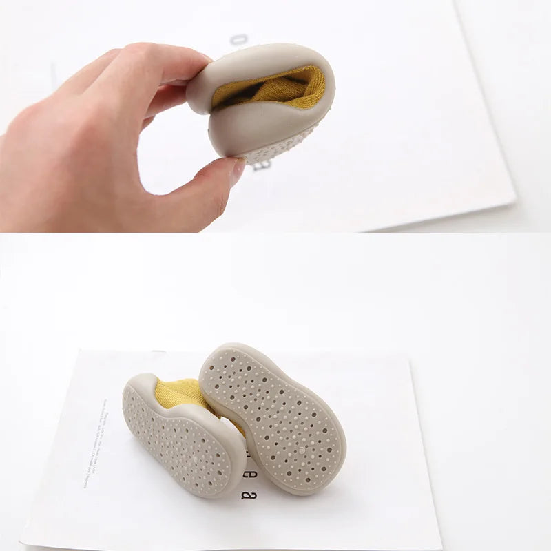 Fashionable soft sole non-slip knit shoes for toddlers, promoting natural foot movement.