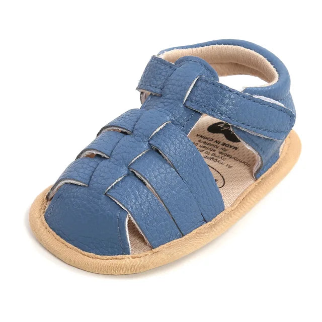 Toddler first walker sandals with a durable yet soft sole, designed for active kids.