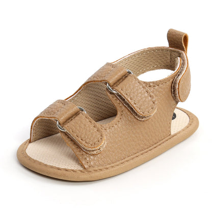 Stacked pairs of colorful soft grip baby and toddler sandals, highlighting variety.