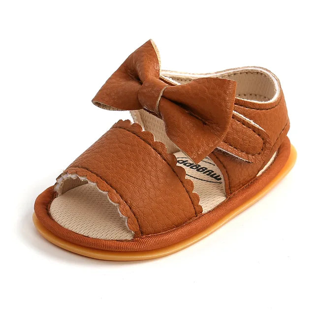 Overhead view of soft grip baby sandals, highlighting their comfortable and secure design.