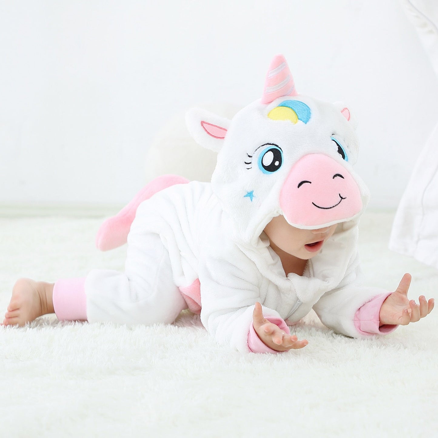 Baby unicorn plush jumpsuit, cozy hooded romper for newborns, perfect for baby shower gift