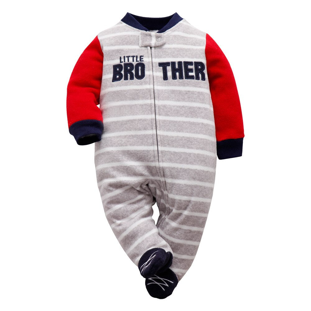 Soft cotton blend baby pajamas in a husky cartoon design, a warm and gentle microfleece jumpsuit.