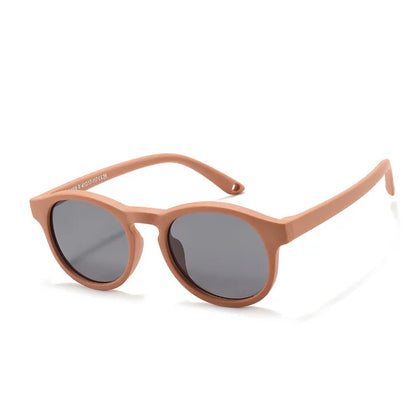 Packaged baby polarized UV400 sunglasses, showing the product in its protective case for children's eyewear.