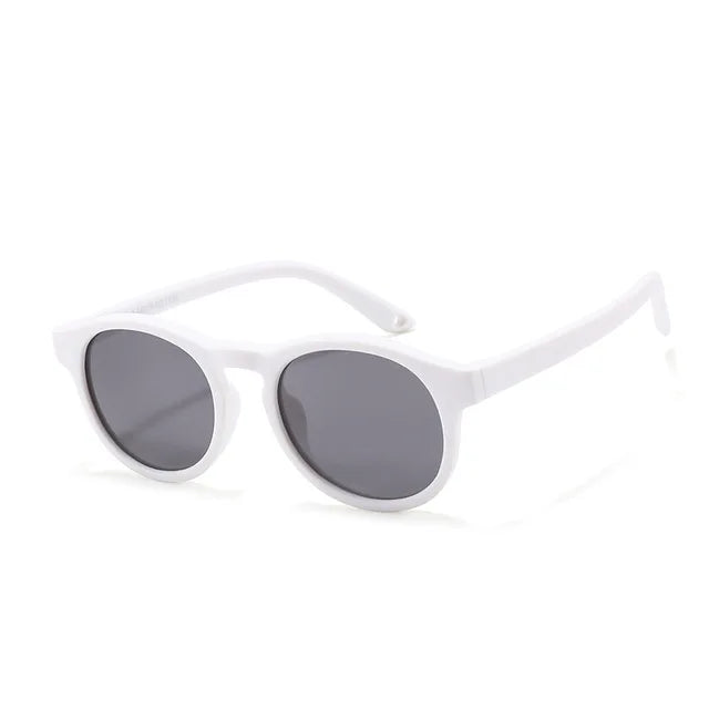 Close-up of the TR-90 frame on baby polarized UV400 sunglasses, highlighting its durability and safety.