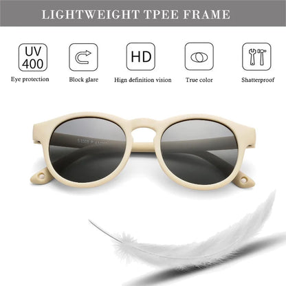 Side view of black baby polarized UV400 sunglasses, highlighting round frame and infant UV protection.