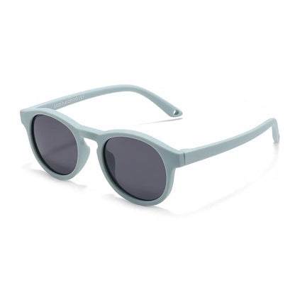 Ergonomic design of baby polarized UV400 sunglasses with a flexible TR-90 frame, ensuring toddler comfort.