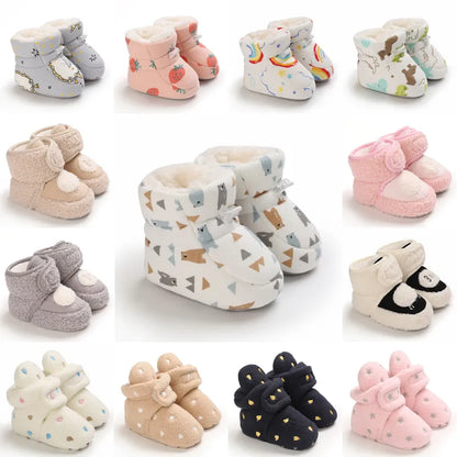Cute fuzzy baby animal slippers, perfect warm winter footwear with a non-slip design for young children.