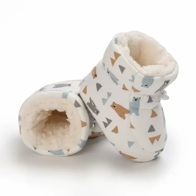 Pair of colorful baby winter animal slippers, non-slip soft sole, designed for infant and toddler comfort.