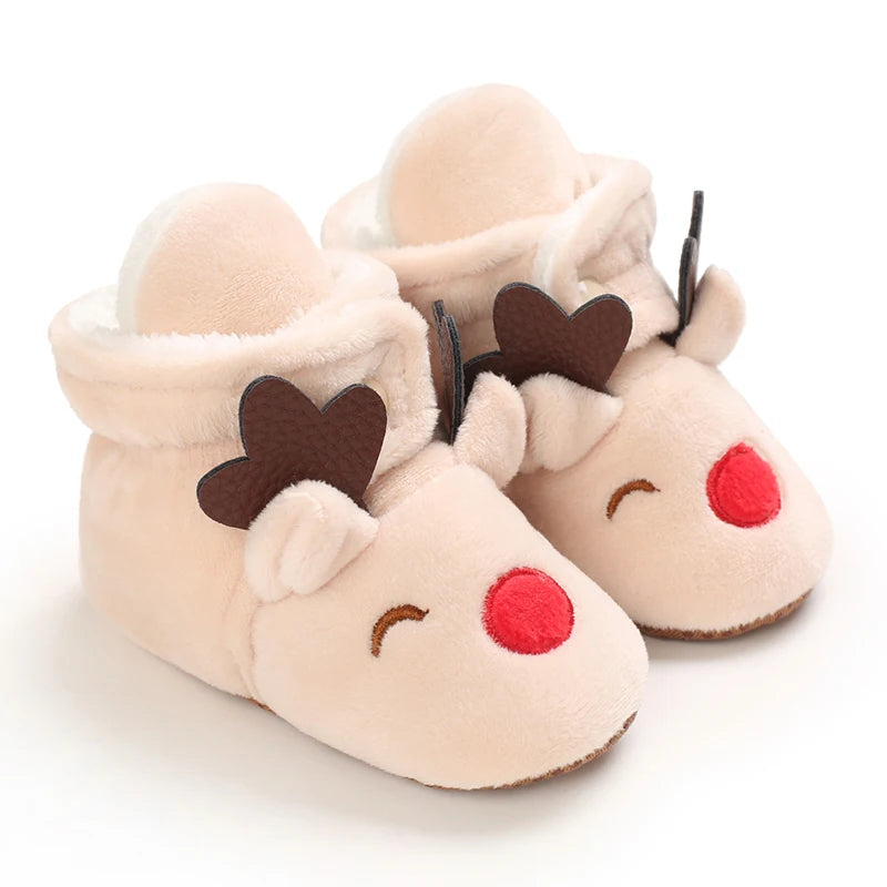 Front view of warm baby winter animal slippers with non-slip soft sole, great for infant shoes.
