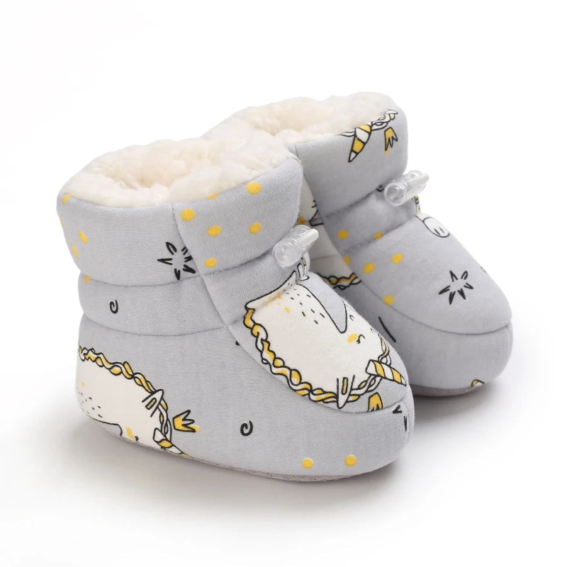 Side profile of a baby winter animal slipper, featuring a non-slip soft sole and cozy infant footwear.