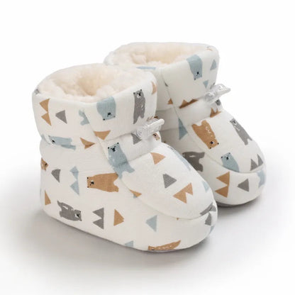 Warm baby animal slippers with non-slip soft sole, essential winter boots for comfortable toddler fashion.